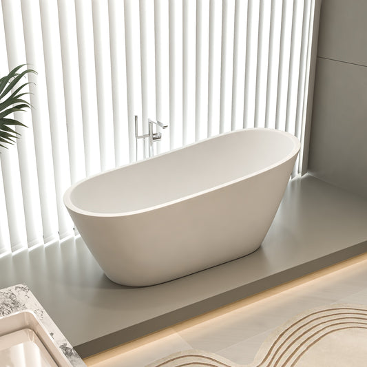 Modern freestanding bathtub with minimalist design, placed in a bright and serene bathroom setting.