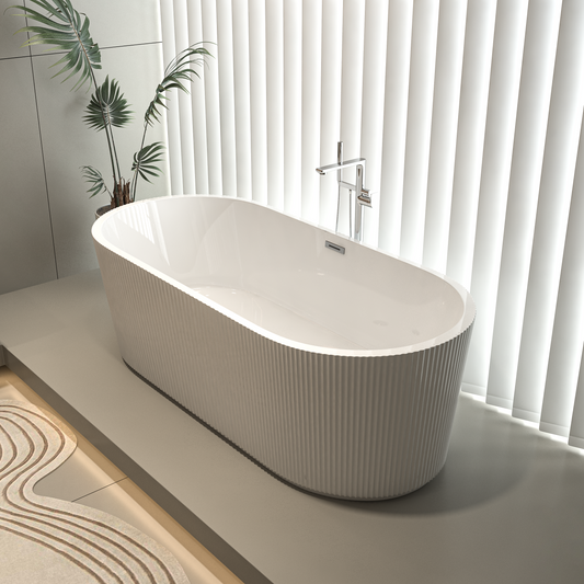 Elegant freestanding tub with grooved white exterior.