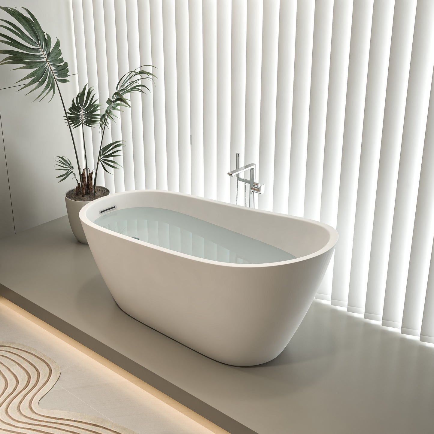 Modern white bathtub filled with water in a minimalistic bathroom.